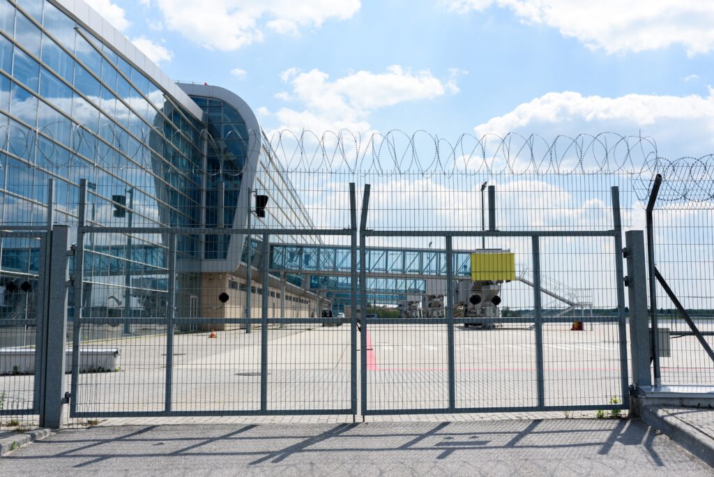 A high-security site featuring a bi folding speed gate for secure access.