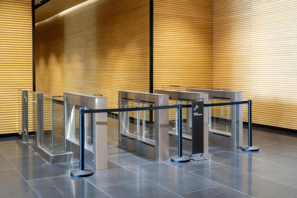 Installation of security turnstiles at a construction site.